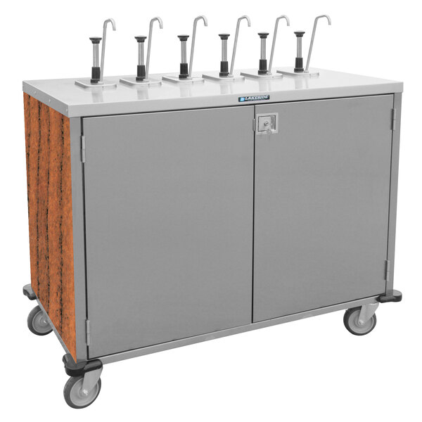 A stainless steel Lakeside serving cart with six metal pumps.