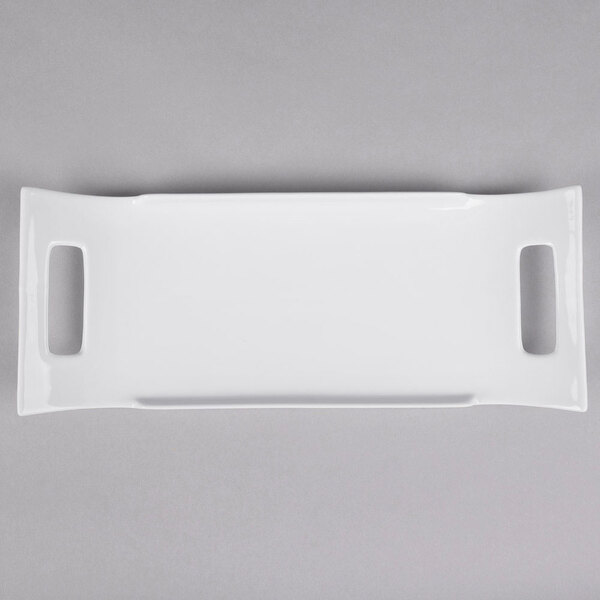 A white rectangular 10 Strawberry Street porcelain platter with two handles.