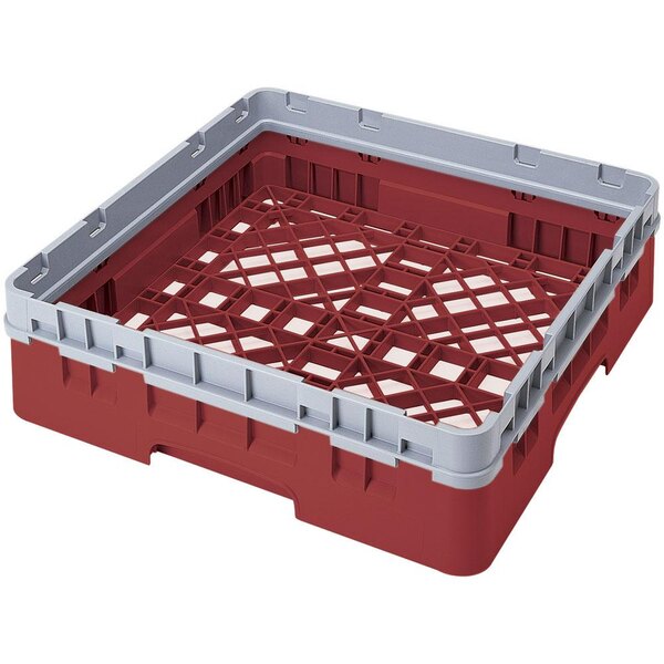 A red plastic Cambro Camrack base with closed sides.