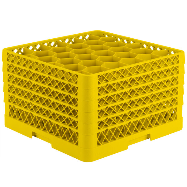 A yellow plastic Vollrath Traex rack with 30 compartments for glasses.