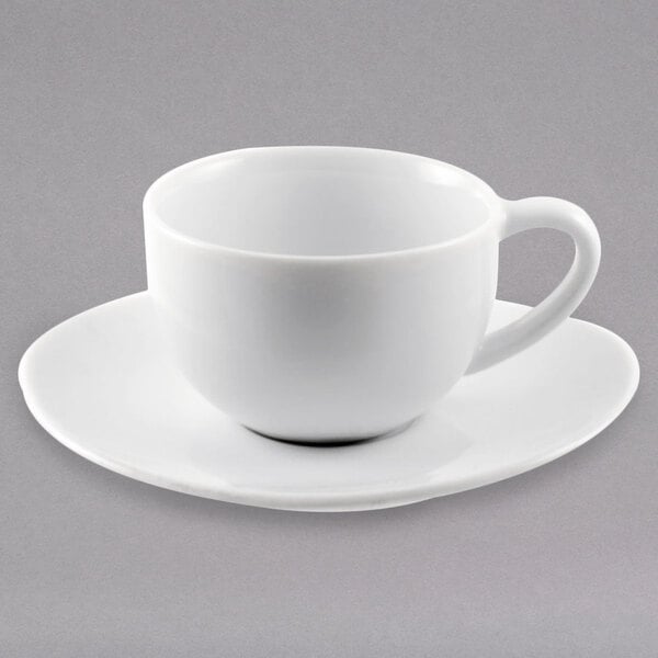 A 10 Strawberry Street Royal white porcelain espresso cup with saucer.