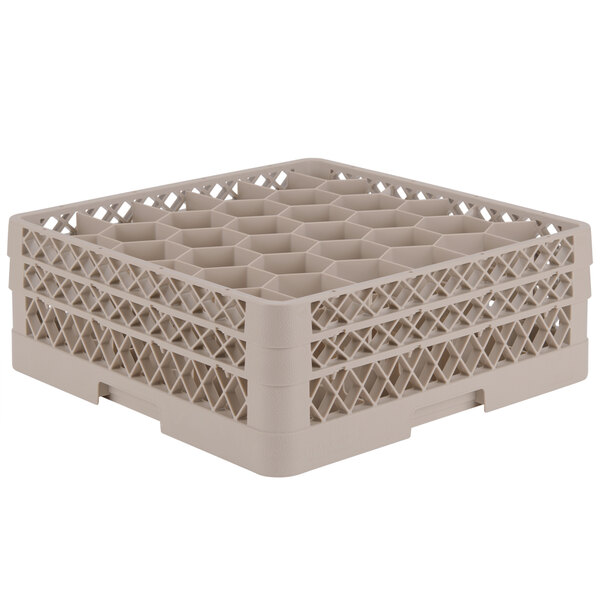 A beige Vollrath plastic rack with 30 compartments for 6 3/8" glasses.