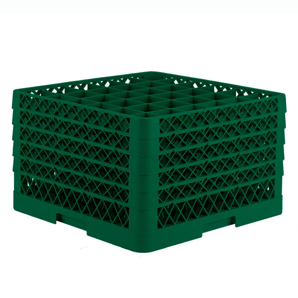A green plastic Vollrath Traex glass rack with compartments.