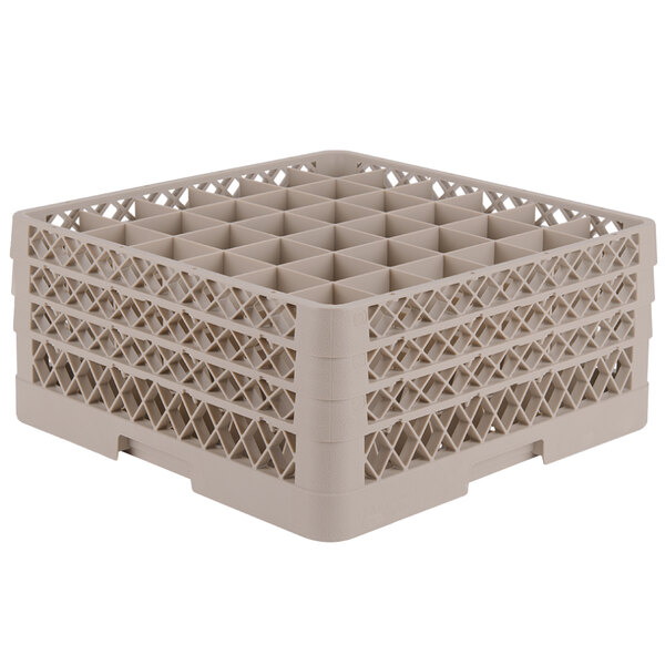 A beige Vollrath plastic rack with 36 small compartments.