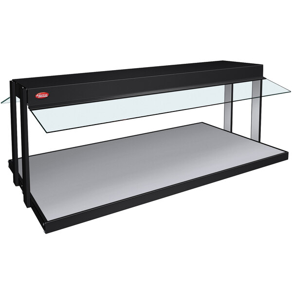 A black Hatco buffet warmer with glass shelves on a counter.
