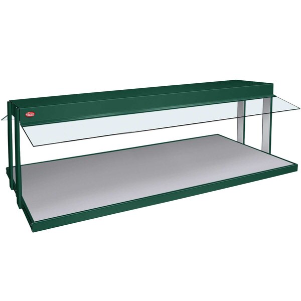 A green rectangular Hatco buffet warmer with a glass top on a white surface.