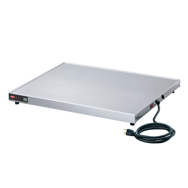 A stainless steel rectangular Hatco heated shelf with a cord.