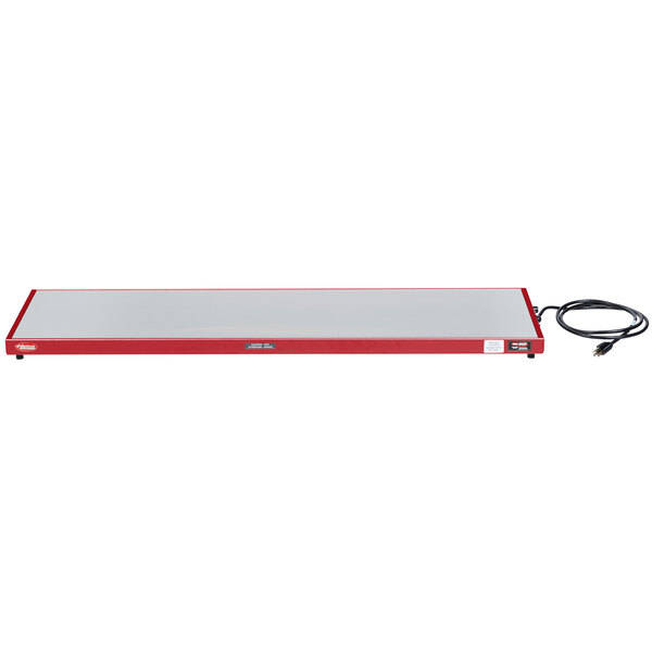 A red rectangular Hatco heated shelf with a white border and a cable.