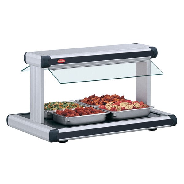 A Hatco countertop buffet warmer with food in it.