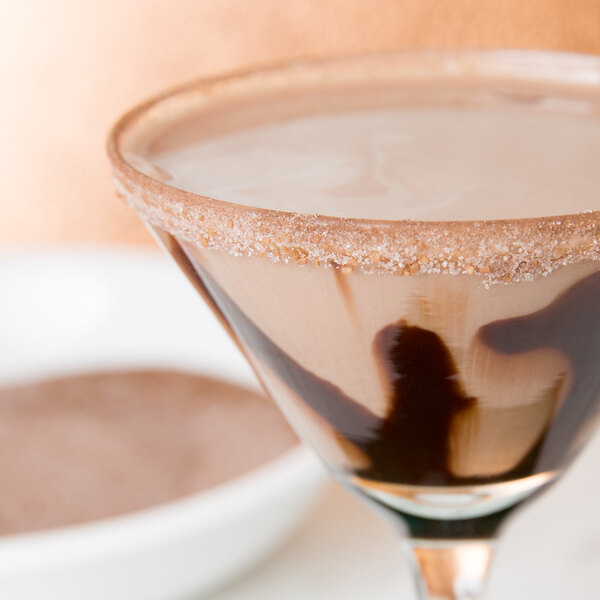 A close-up of a Rokz chocolate cocktail rimmed drink.