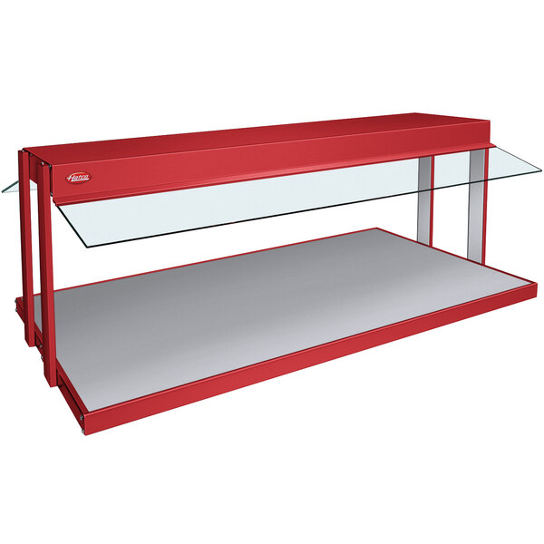 A red and white Hatco countertop buffet warmer with glass shelves.