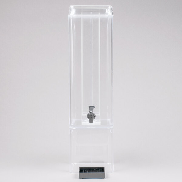 A clear plastic beverage dispenser with a clear plastic ice chamber and side handles.