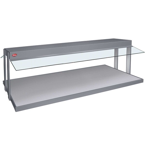 A grey granite countertop buffet warmer with a glass top shelf.