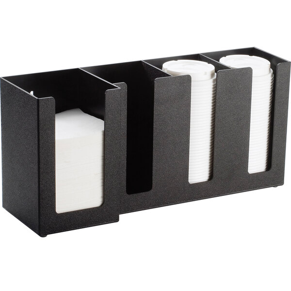 A black Cal-Mil countertop organizer with white cups and napkins in it.