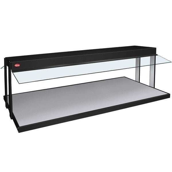 A black Hatco countertop buffet warmer with a glass top.