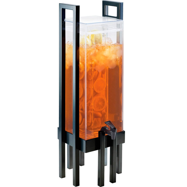 A Cal-Mil beverage dispenser filled with orange juice and ice with an infusion chamber.