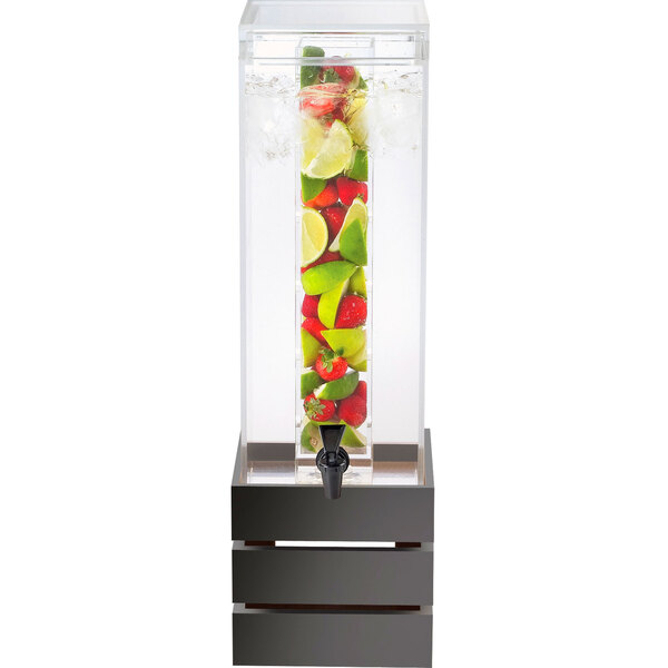 A Cal-Mil Midnight Bamboo beverage dispenser with fruit inside.