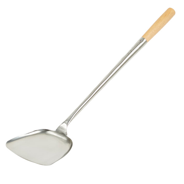 A silver metal wok spatula with a wooden handle.