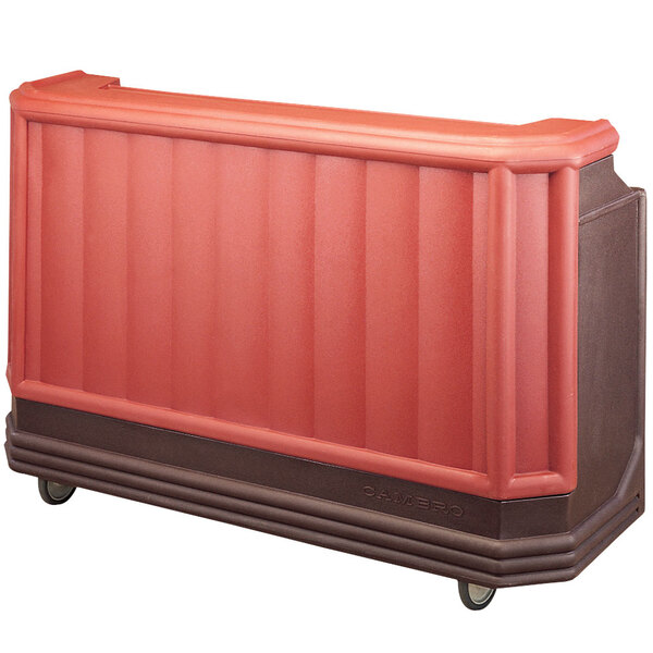 A rectangular brown Cambro portable bar with a red bar top refrigerator inside.