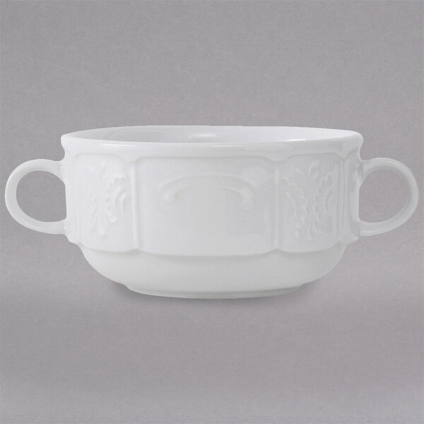 A Tuxton bright white china mug with two handles.