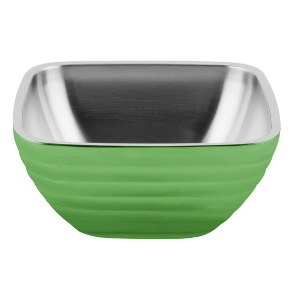 A green Vollrath metal serving bowl with a silver rim.