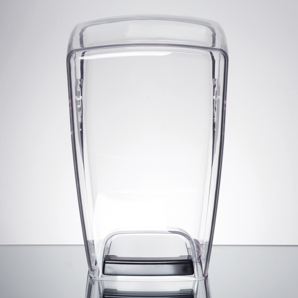 A Waring clear glass container with a black base.