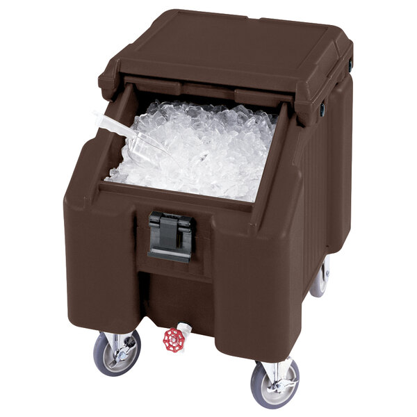 A dark brown Cambro mobile ice bin with a sliding lid and ice inside.