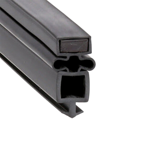 A close-up of a black rubber seal with two holes.