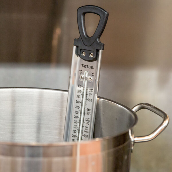 A Taylor Candy / Deep Fry Paddle Thermometer in a pot.