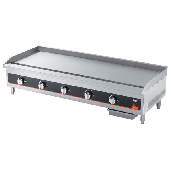 A Vollrath Cayenne gas countertop griddle with manual control knobs on a counter.