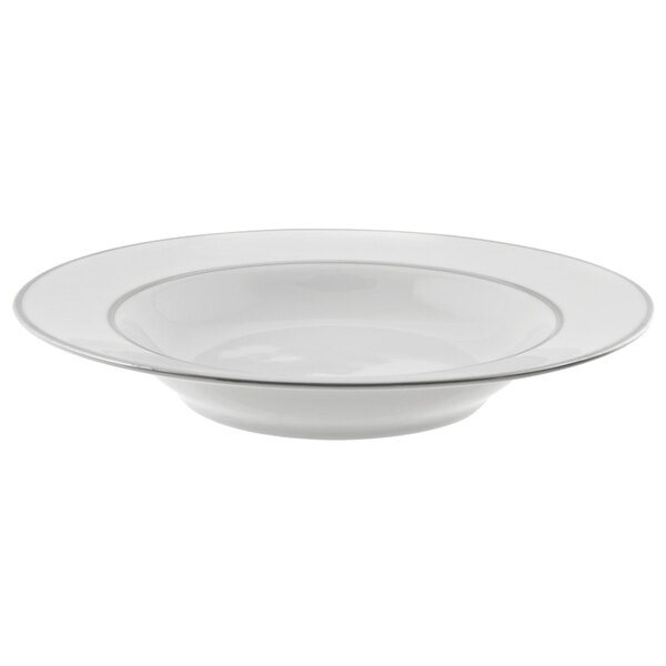 A white porcelain bowl with a silver rim.