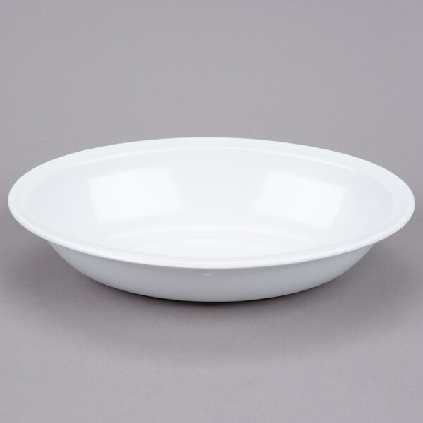 A white GET SuperMel oval melamine serving bowl on a gray surface.