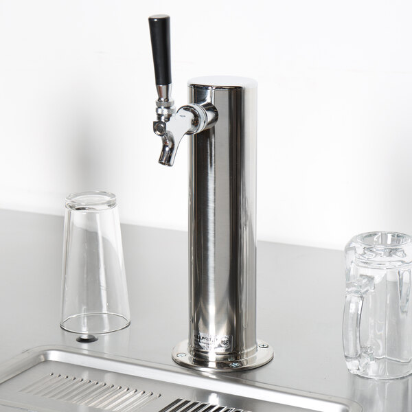 A Beverage-Air stainless steel tap tower with two glasses on a counter.