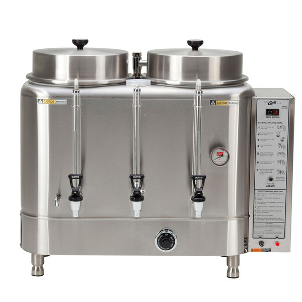 A stainless steel Curtis twin coffee urn machine with two lids.