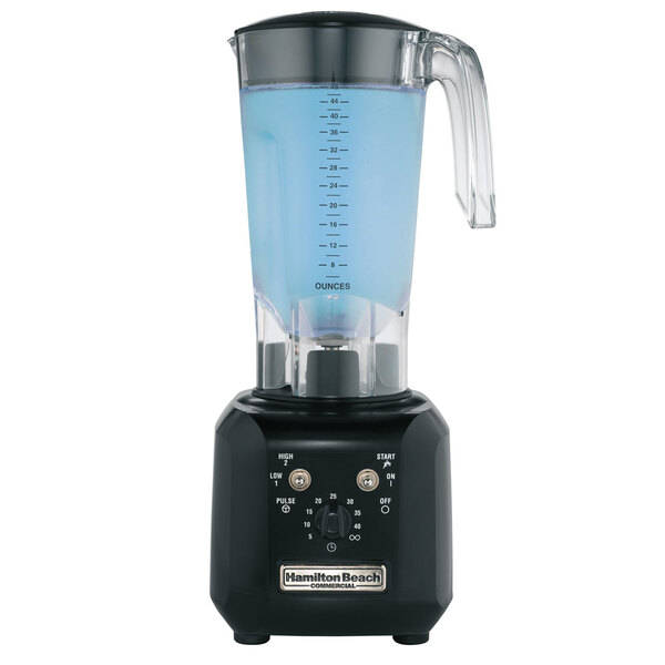 A Hamilton Beach bar blender with a clear container and clear lid filled with blue liquid.