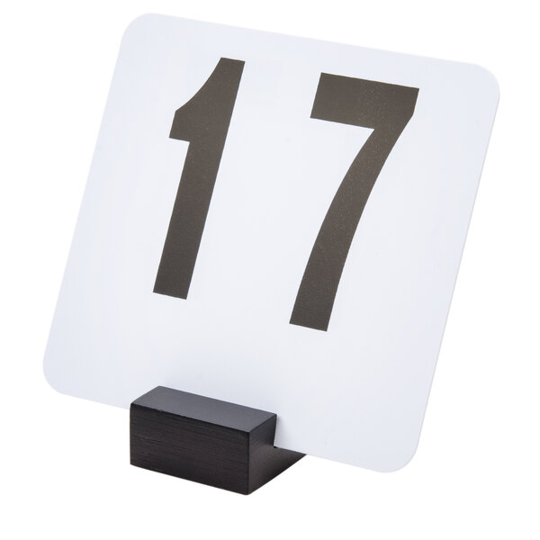 An American Metalcraft black bamboo table card holder with black numbers on white paper.