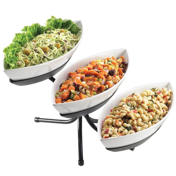 A row of Cal-Mil black display bowls filled with pasta, lettuce, and olives.