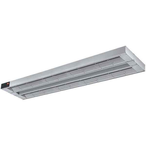 A long rectangular stainless steel Hatco infrared warmer with lights on each end.