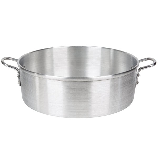An aluminum steamer water pan with handles.
