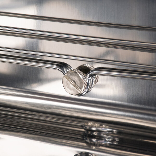 A stainless steel rack support for an Avantco convection oven.