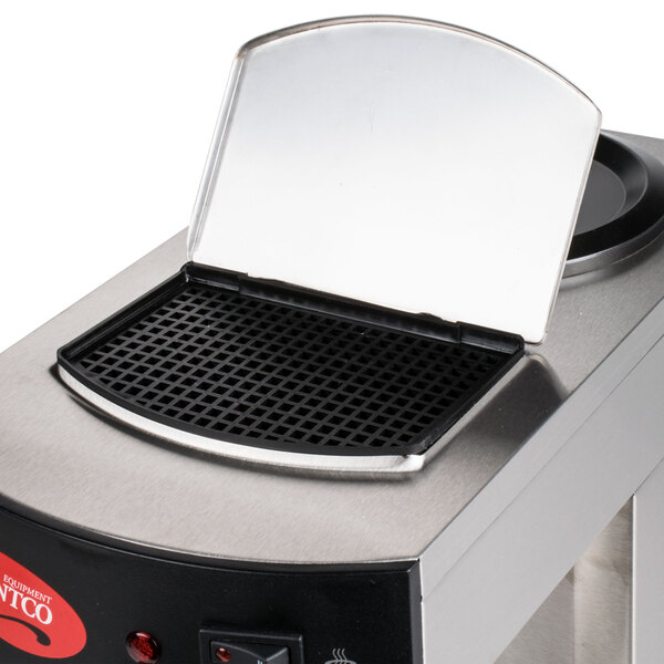 An Avantco coffee machine reservoir screen on a counter.