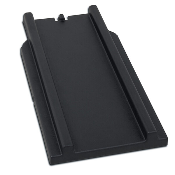 A black rectangular plastic locator guide with a small hole in it.
