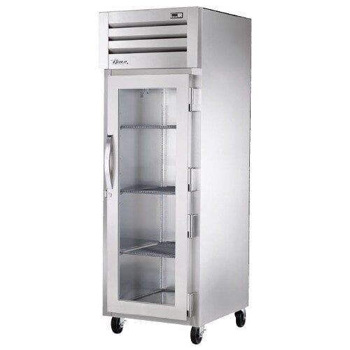 A white metal True heated holding cabinet with glass doors.