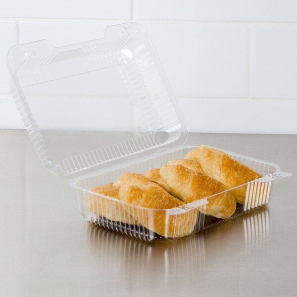 Dart C40UT1 StayLock 9 3/8" x 6 3/4" x 3 1/8" Clear Hinged Plastic Medium High Dome Oblong Container - 125/Pack