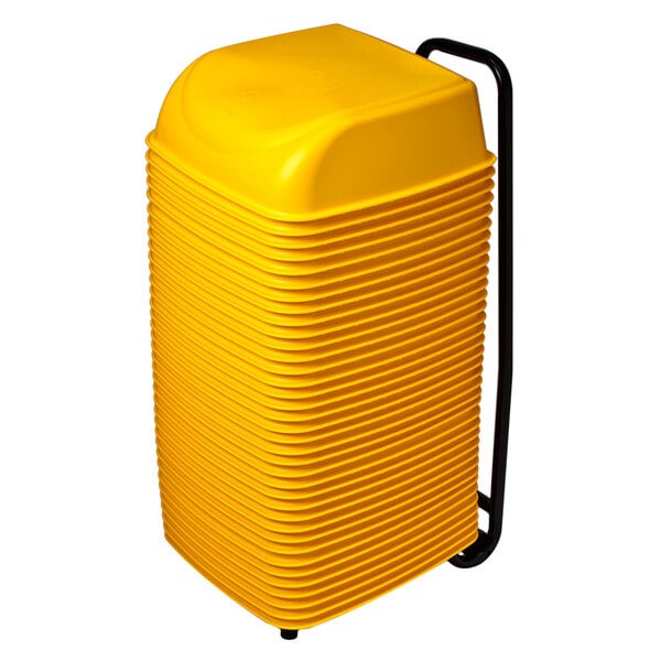 A stack of yellow Koala Kare plastic booster seats with a black handle.