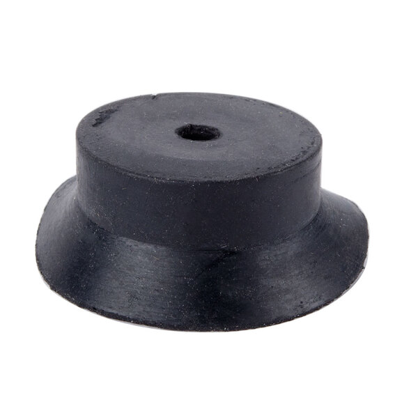 A black rubber Waring foot for a milkshake machine on a table.