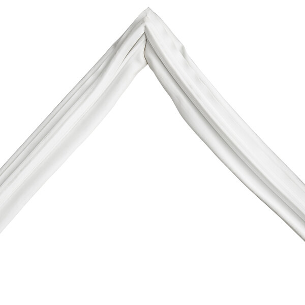A close-up of a white vinyl door gasket.