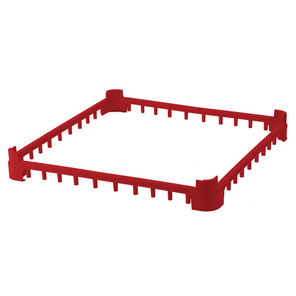 A red plastic Vollrath extender with holes.