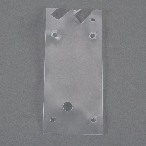 A white plastic plate with holes.