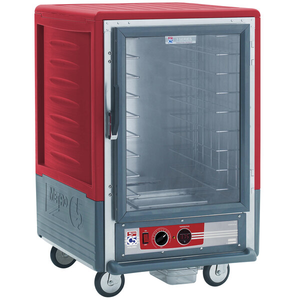 A red and silver Metro C5 heated holding cabinet with a clear door.